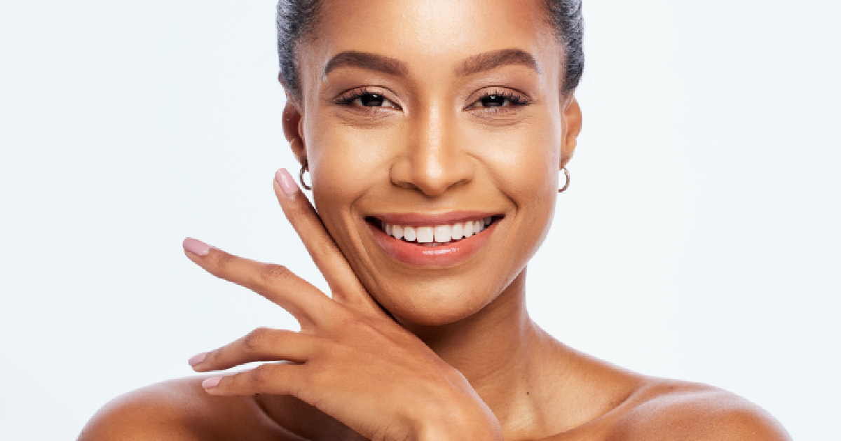 Women applying Glo2 Facial in Foxboro, MA