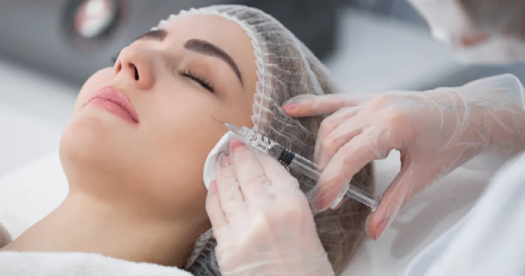 How Natural Growth Factor Injections Improve Skin Tone And Texture 1 Young woman with eyes closed receiving a Natural Growth Factor injections from a medical professional in Foxborough, MA